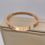 Класичний жорсткий браслет Cartier рожеве золото 2