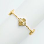 Браслет з конюшинами Van Cleef з металевою серцевиною лимонне золото