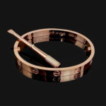 Класичний жорсткий браслет Cartier з викруткою рожеве золото