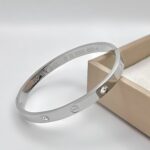 Класичний жорсткий браслет Cartier з камінням срібло