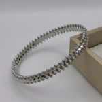Жорсткий браслет Cartier Clash з рухливими елементами срібло