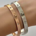 Класичний жорсткий браслет Cartier з викруткою