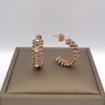 Сережки Cartier Clash з рухливими елементами у рожевому золоті 1