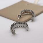 Сережки Cartier Clash з рухливими елементами у сріблі 2