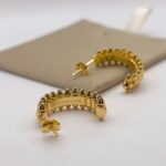 Сережки Cartier Clash з рухливими елементами у лимонному золоті 2