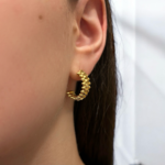 Сережки Cartier Clash з рухливими елементами у лимонному золоті 3