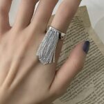 Срібна каблучка з ланцюжками та пробою 4