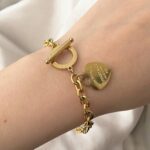 Ланцюговий браслет Tiffany лимонне золото на руці