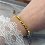 Браслет Cartier Clash з рухливими елементами та логотипом лимонне золото