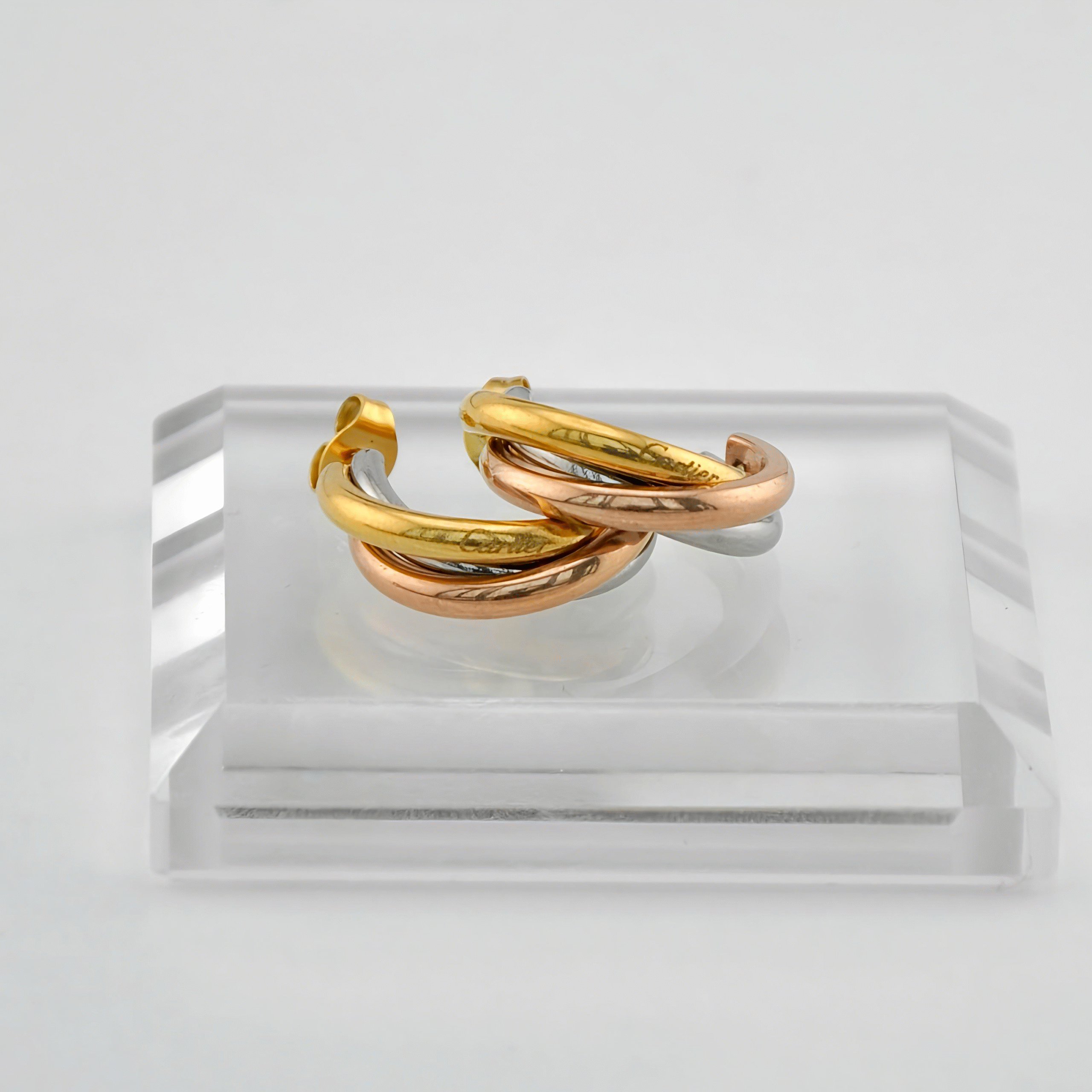 Потрійні сережки півкільця Cartier з логотипом лого