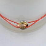 Нитковий браслет Cartier з логотипом червоний