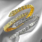 Жорсткий браслет з камінням BVLGARI у вигляді змії