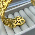 Широкий жорсткий браслет Hermes з логотипом золото лого