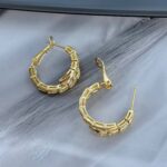 Маленькі сережки-кільця BVLGARI у вигляді змії золото застібка