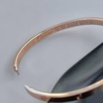 Тонкий жорсткий браслет Cartier з логотипом рожеве золото лого