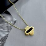 Класичний підвіс Van Cleef з логотипом у золоті лимонне чорний лого