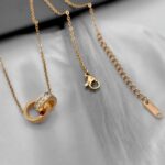 Підвіс Cartier з двома з'єднаними кільцями з камінням рожеве золото застібка