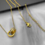 Підвіс Cartier з двома з'єднаними кільцями з камінням лимонне золото застібка