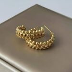 Сережки Cartier Clash з логотипом золото