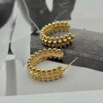 Сережки Cartier Clash з логотипом золото лого