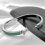 Вишуканий жорсткий браслет Hermes з логотипом у сріблі зелений лого