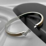 Вишуканий жорсткий браслет Hermes з логотипом у сріблі бежевий лого