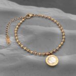 Браслет BVLGARI з кульками та двостороннім підвісом білий