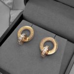 Подвійні сережки Cartier з камінням та логотипом рожеве золото2