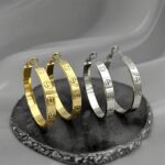 Великі сережки-кільця Cartier