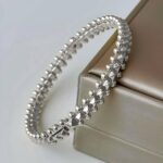 Жорсткий браслет Cartier Clash з логотипом срібло